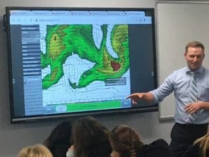 image of Meterologist visit featuring a Meterologist explaining how a weather map works